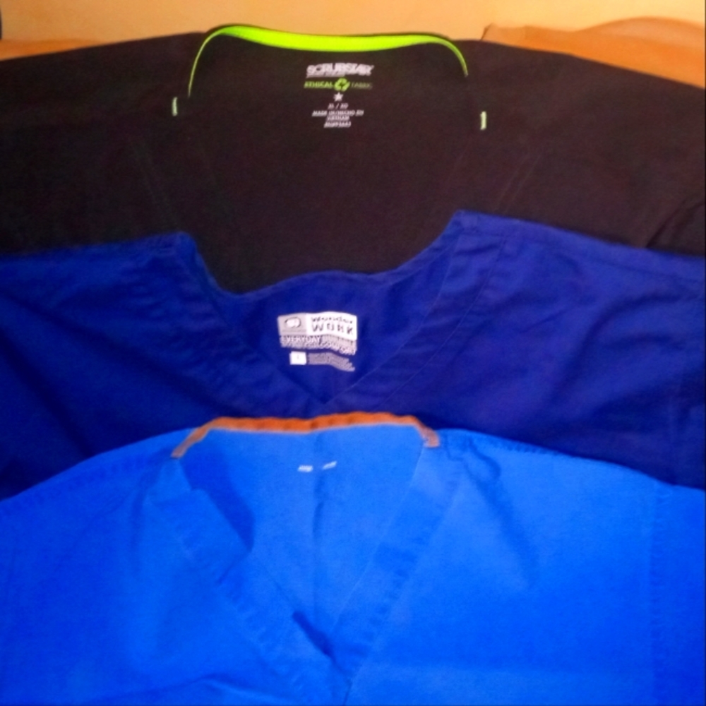 Three sets of Scrubs mixed colors size is large